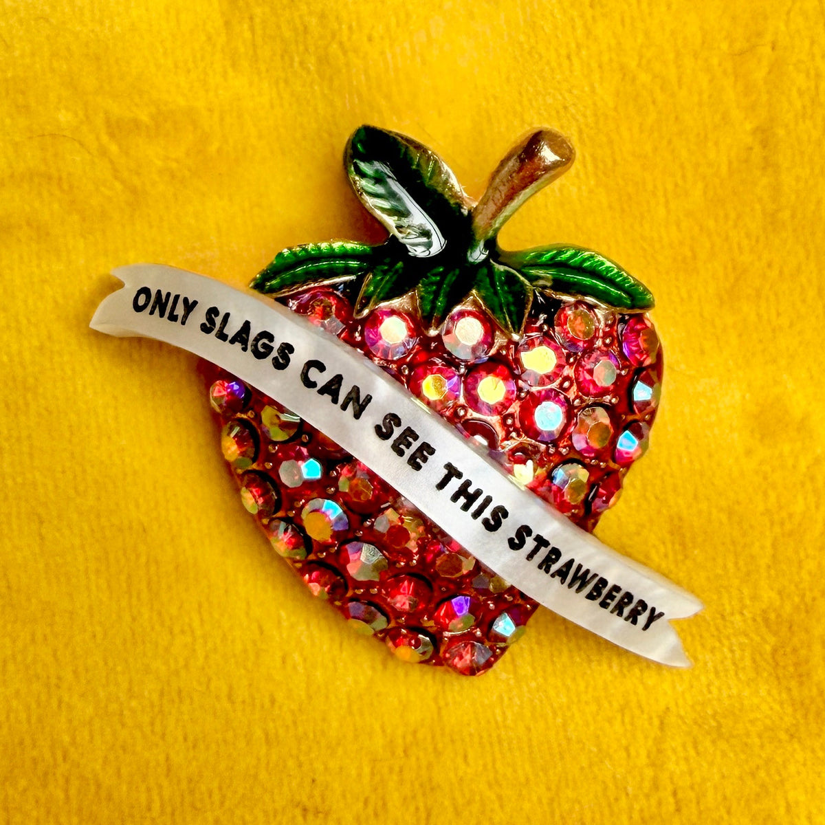 Invisible strawberry, diamanté pin.