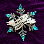 Seasonal Depression, diamanté snowflake pin.