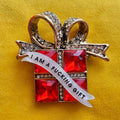 I am an actual Fucking GIFT!, diamanté present pin