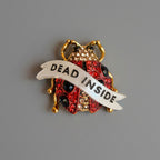Dead Inside, ladybird pin