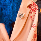 How your email finds me, withered up skull pin.