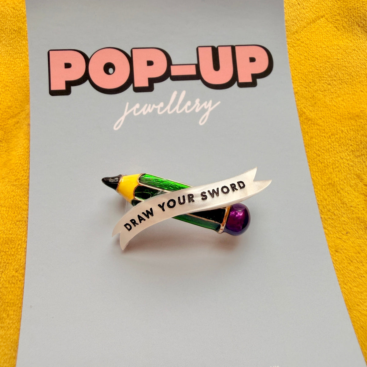 DRAW YOUR SWORD! Artistic rebellion pin