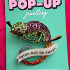 A CHAMELEON THAT’S GIVEN UP. Diamanté pin