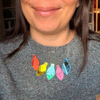 Having a Breakdown, festive lights necklace.