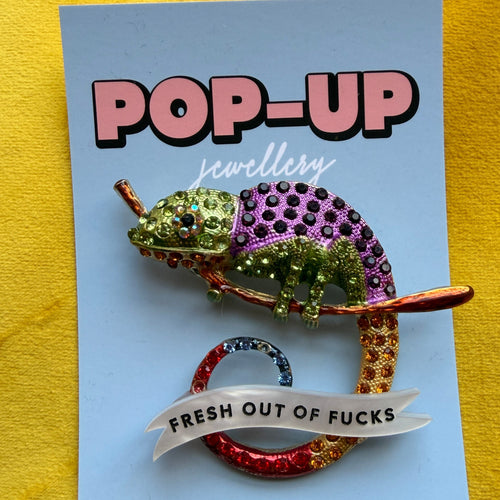 A CHAMELEON THAT’S GIVEN UP. Diamanté pin