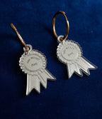 THE WORST (YAY) rosette earrings