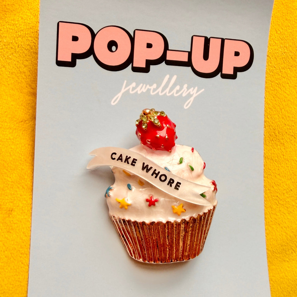 Cake Whore, enamel cupcake pin