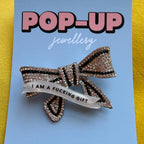 I Am a FUCKING GIFT, diamanté bow pin