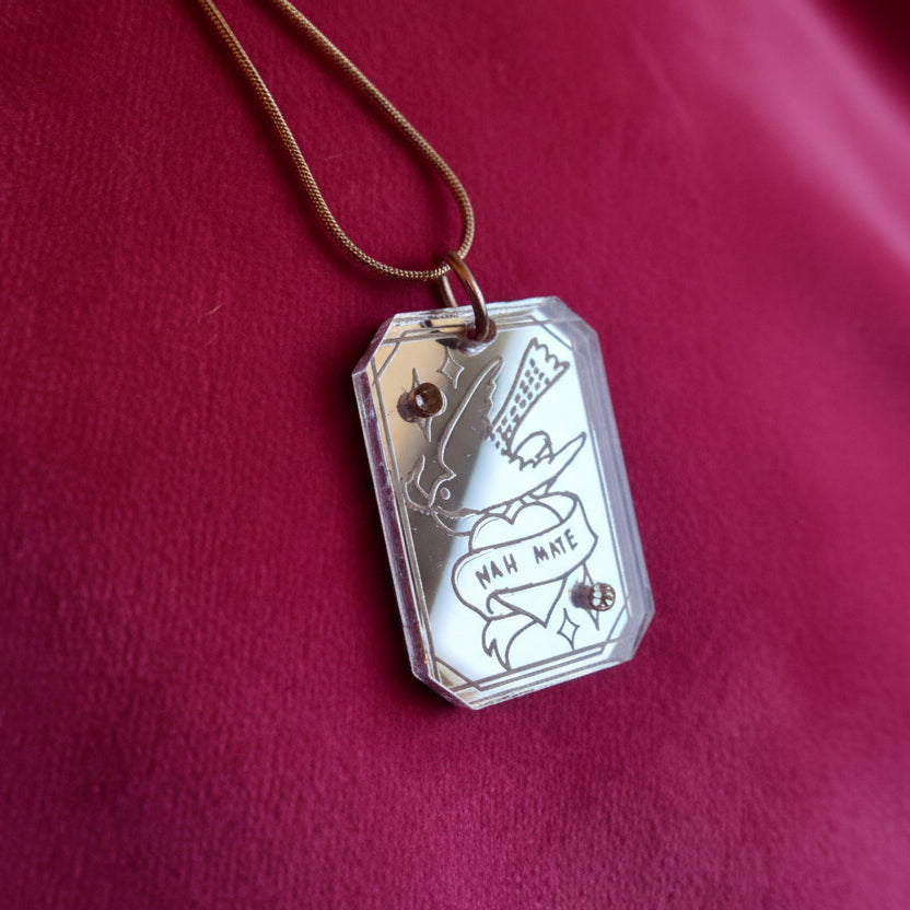 NAH MATE engraved bird pendant