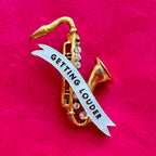 The SAXOPHONES ARE GETTING LOUDER… diamanté pin