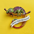 A CHAMELEON THAT’S GIVEN UP. Diamanté pin