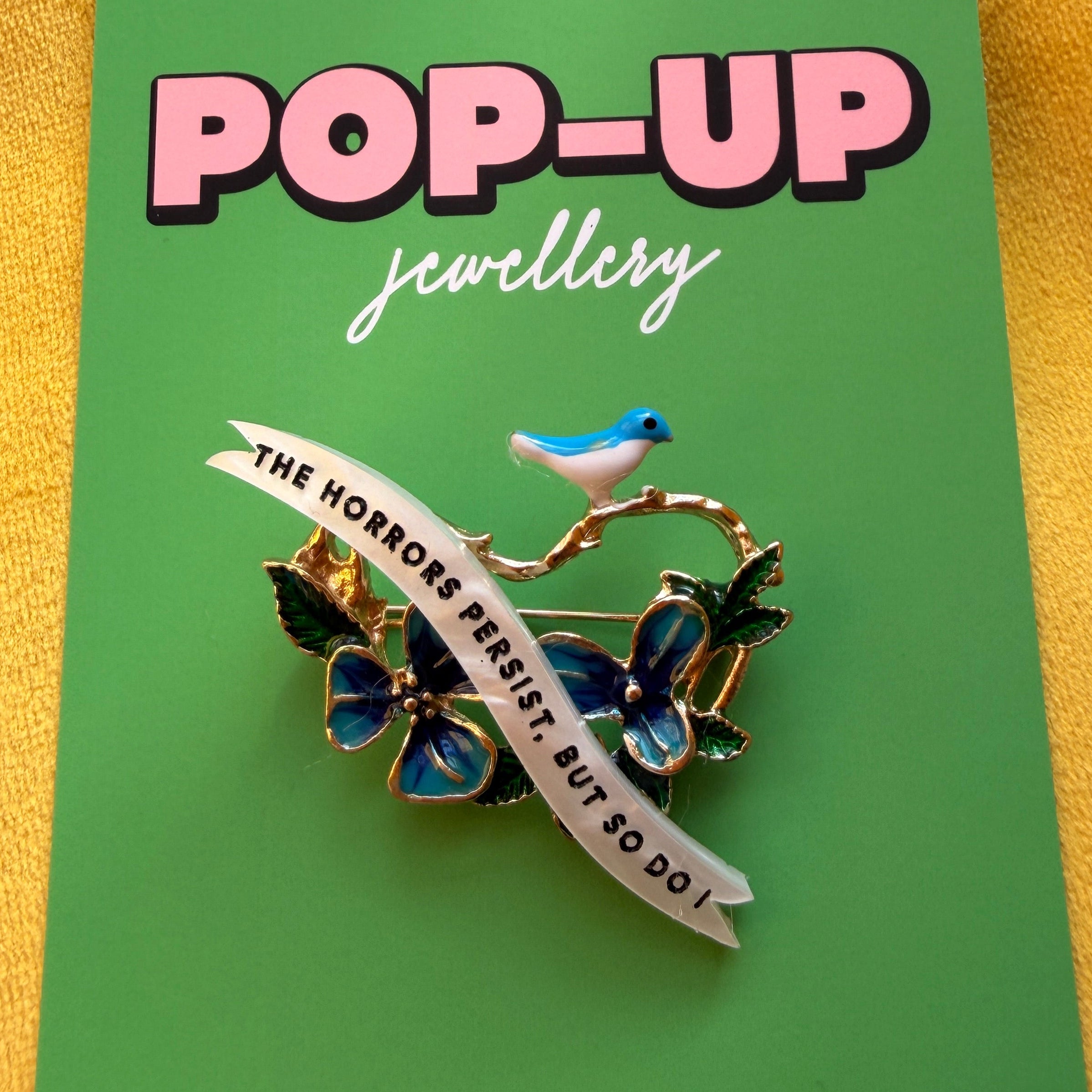 The horrors persist… bird brooch