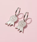 I am going to succeed because I am crazy, rosette earrings.