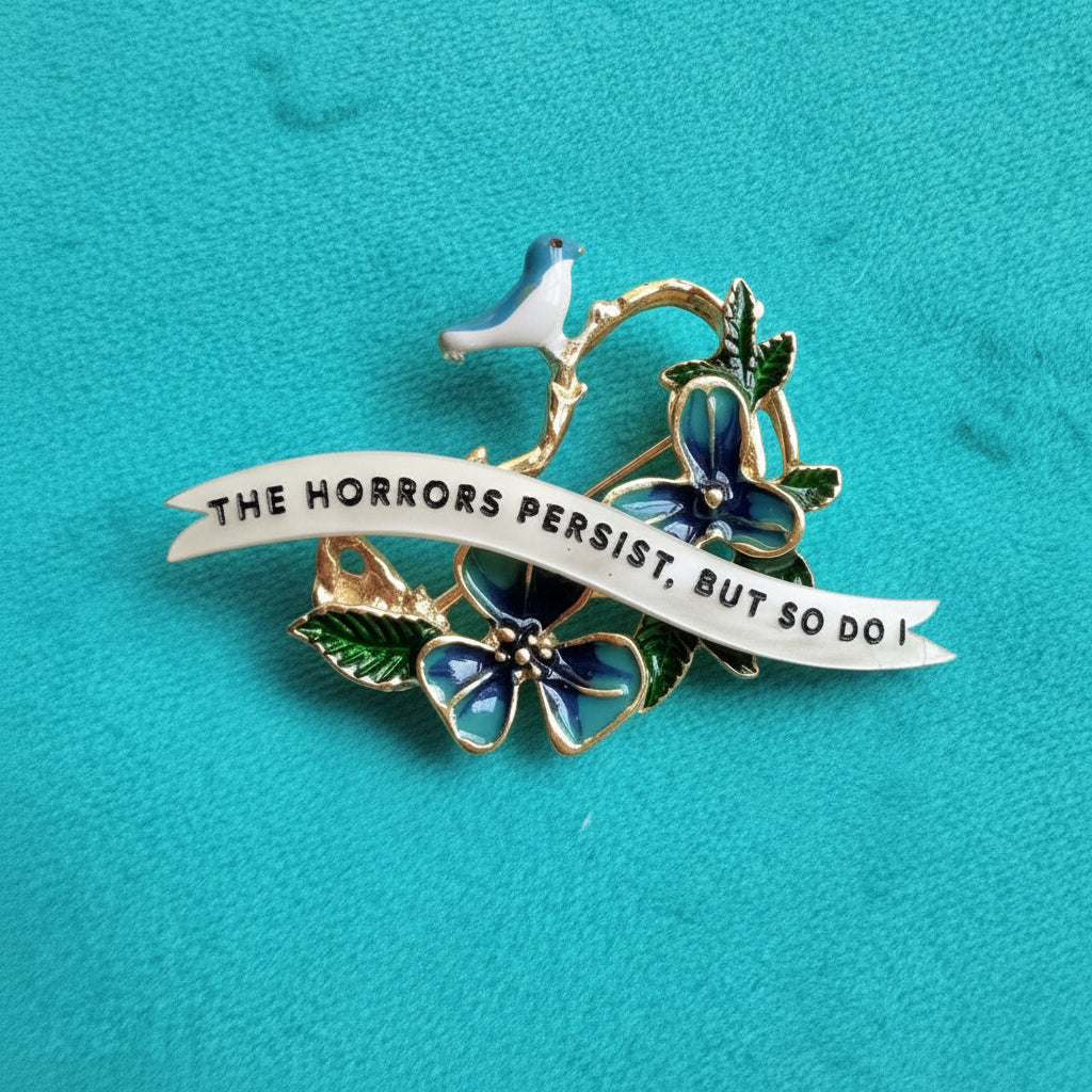 The horrors persist… bird brooch