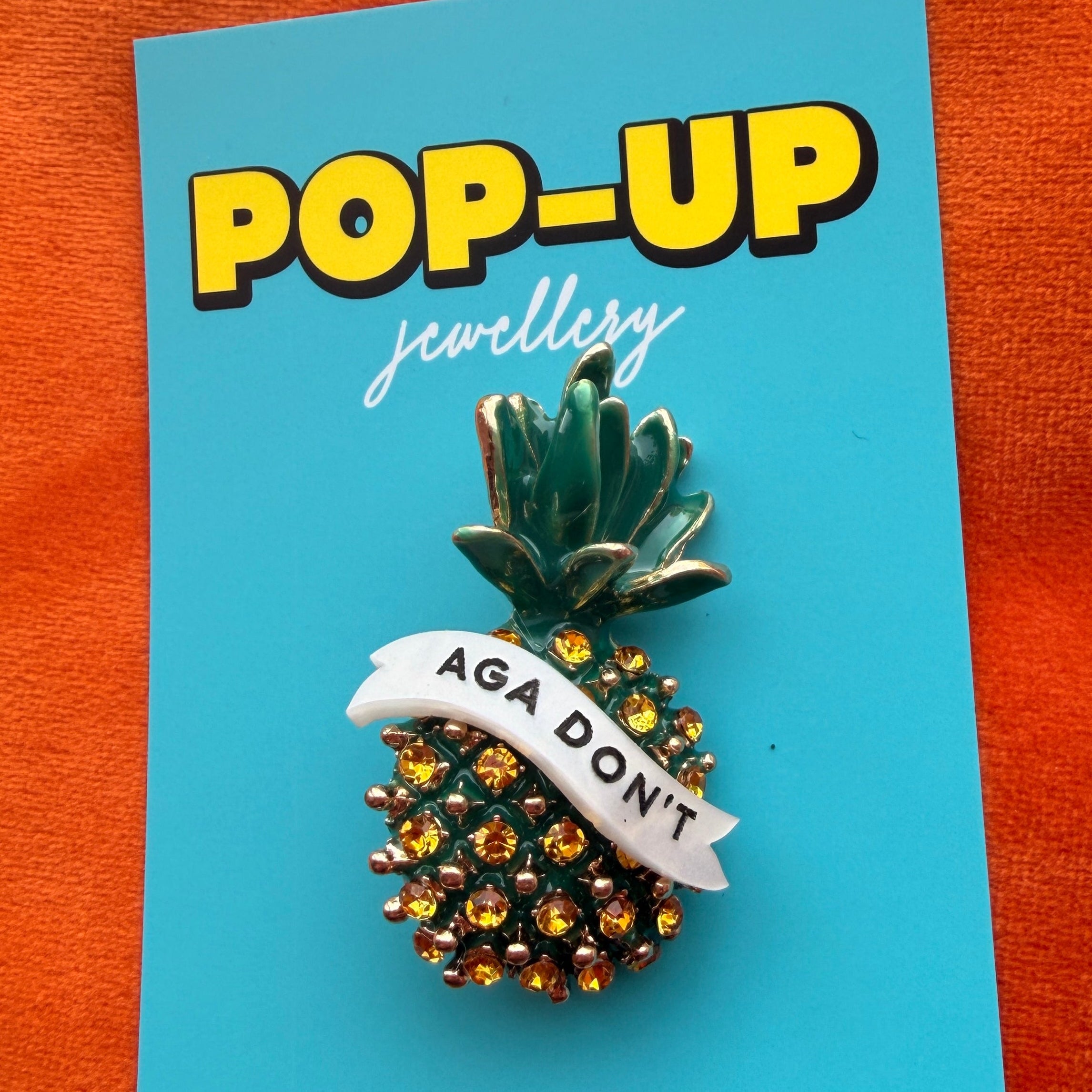Push pineapple shake the tree. Diamanté pin