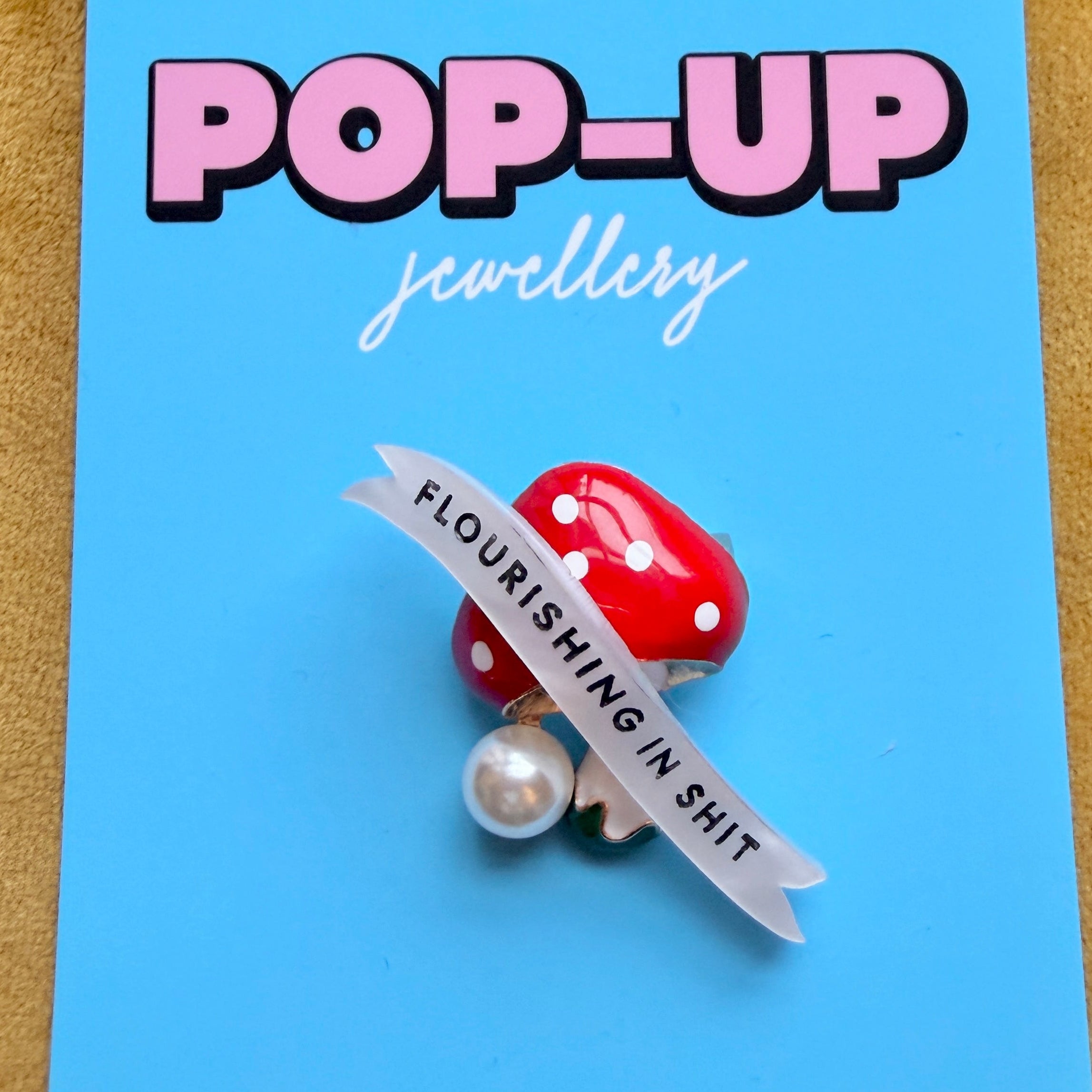 Flourishing toadstool pin