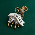 GOATED diamanté pin
