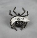 NOPE spider diamanté pin