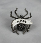 NOPE spider diamanté pin