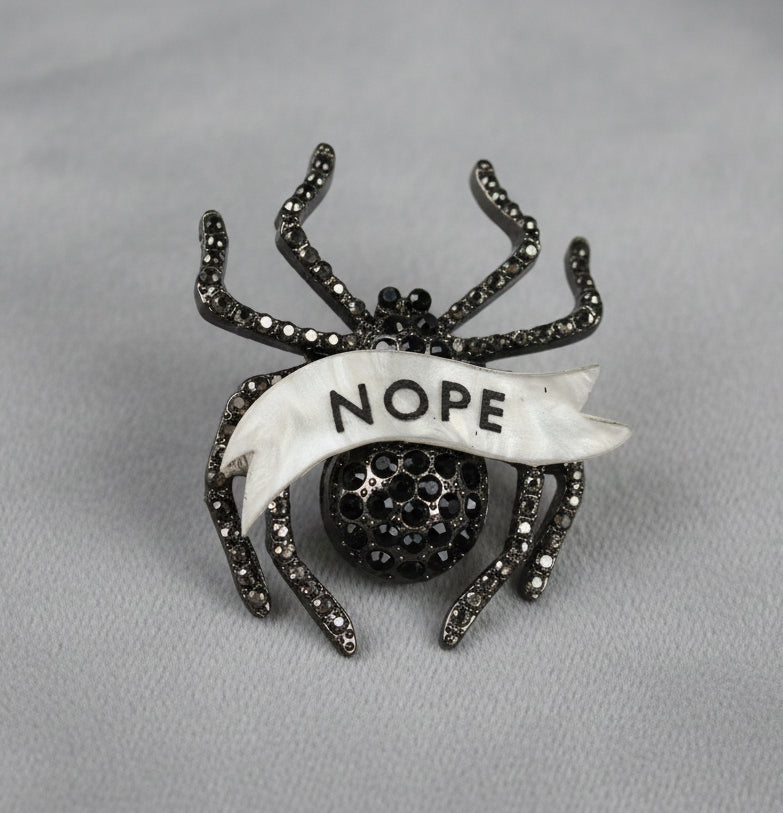 NOPE spider diamanté pin