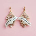 DON’T be a Dick, Diamanté princess earrings.