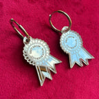 SHIT SHOW COORDINATOR, rosette earrings.
