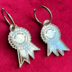 SHIT SHOW COORDINATOR, rosette earrings.