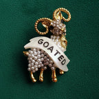 GOATED diamanté pin