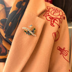 The horrors persist… bird brooch