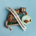 Not to be left unsupervised, naughty cat diamanté pin.