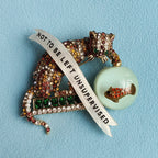 Not to be left unsupervised, naughty cat diamanté pin.