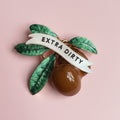 Dirty Martini, olive pin