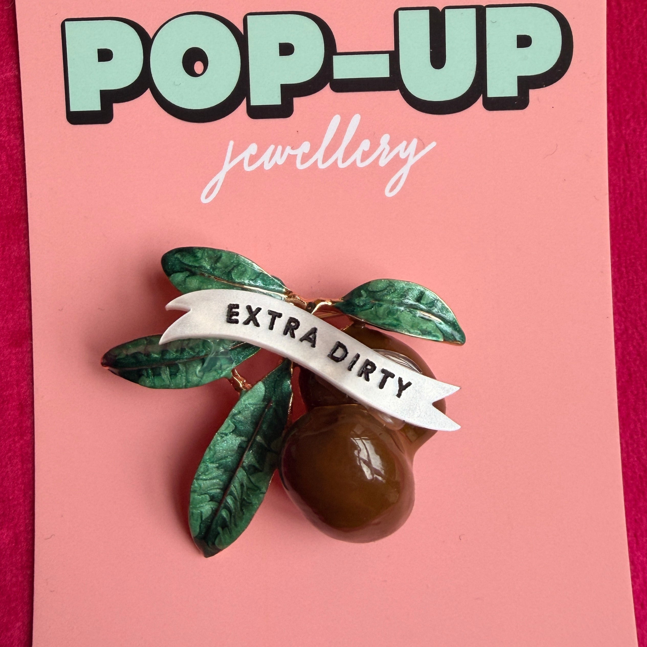 Dirty Martini, olive pin